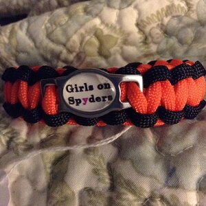 Orange and Black Girls on Spyders bracelet :)