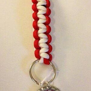 Red/White keychain for Girls on spider member from Paracord Colars, Leashes and More Facebook page.
