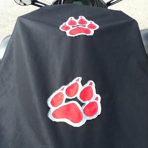Finished sport cover with wolf paws.