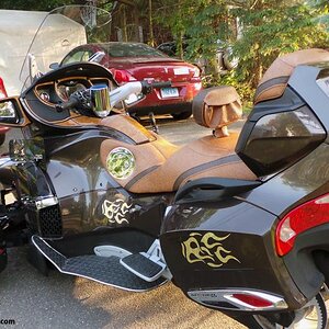 gold leaf flames 21 style.  Spyder RT flame kits available. Email us your ideas:  pete@powersportsWraps.com