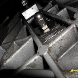 Rear of passenger Seal Floorboards L shaped bracket fitting using larger S/S Washer Nyloc nut and dome nut