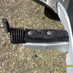 Side view of extension to OEM Footrest due to disability -
Pre Seal Floorboards