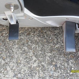 Both brackets L Shaped and OEM Footrest - showing the Foam rubber inserts laid on top ready for Seal Floorboards