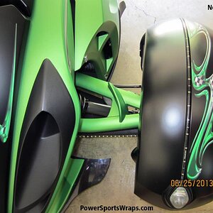 We created this fender piece to help pull the colors of the machine out onto the fenders. What a great touch.. Email: pete@powersportswraps.com