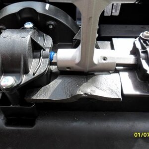 Foam rubber strip 3mm thick under the middle bracket  used as  anti-vibration dampener when the Windshield is in the down position