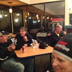 Len, Tina, and Paula chatting at the motel.