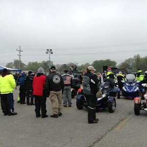 Everyone watching the trophy presentation for drag racing and bike constest