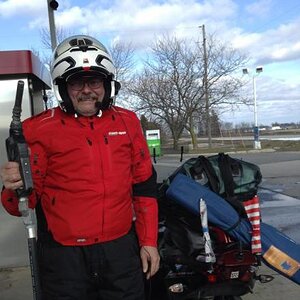 Gassing up on the way to Spyderfest...still in our winter gear!