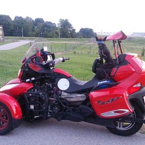 Teddy ryde'n redneck style with a stripped sled at the airport viewing area
