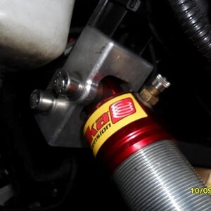 Close up view of the rear of the Pitbull relocators in place Note - Bolts go in from the rear and the thread is at the front (Same on both sides)