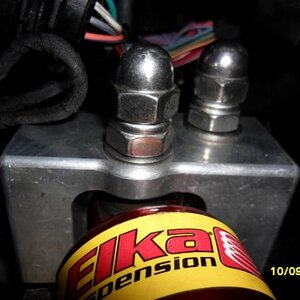 S/S Dome nuts in place  Extra protection against any wires catching against the bolt threads