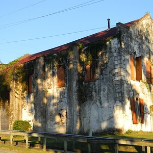 An old abandoned building which originally was a fish and seafood processing center. Just below it is Skipper's Seaford Restaurant, some of the best o