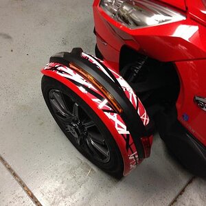 Fender frame cover with Plasti-Dip and TricLED reflector lights made into running/turn signals.