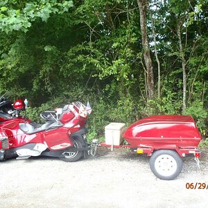 The Red Spyder - custom paint and trailer by our