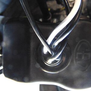 WIres through grommet on cover