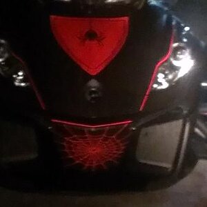 Night time Reflective 3m film from Wrap My Spyder W/ 1/4" reflective tape in the seams of the panels