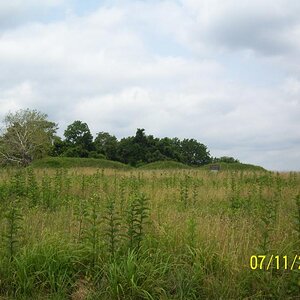 Mounds built as defensive barriers.