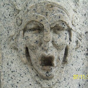 Raised face on Victory Arch.