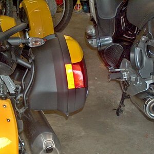 BRP Version GIVI Bag.  Difference between reflective tape & modified lens.