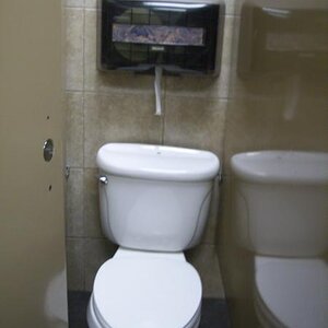 This baffled me. That's not toilet seat liner! How do you reach around for the paper when done while still sitting on the throne? Seems a bit messy so