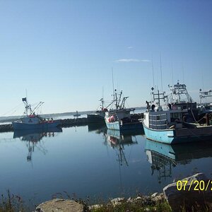 Fishing boats near the Forchu lighthouse area.