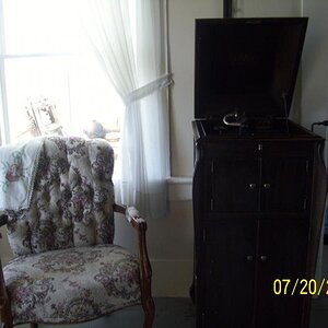 Phonograph and chair.