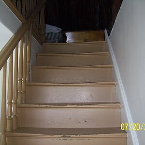 Very worn stair treads in the Duon house.