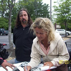 Dee (SeBrez) I forgot to see the plate; signing our banner.