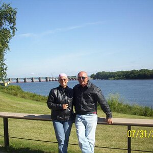 Us at the MN rest area welcome center. The Mississippi River behind.
