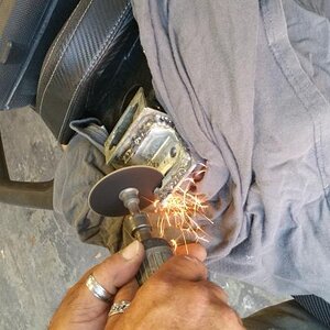 welding and cutting down the bracket to make it easier to reinstall the rear center plastic
20150521 192102