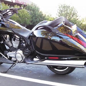 Had the trunk removed right away. Looks 100 times better and 50 pounds lighter!