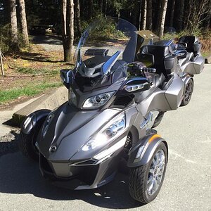 Side air scoops, F4 tall wide vented windscreen, custom dynamics fender / signal lights.