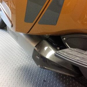 Carbon Fiber passenger heal guards from Big Bike Parts.com.