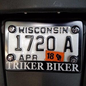 close up of license bracket, fasteners