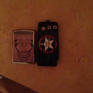 For scale, yes regular full size zippo, the keyport is just a lil thicker the width of a coin fyi