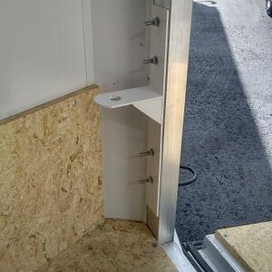 Custom bracket fabricated to hold 1 7/8 ball.