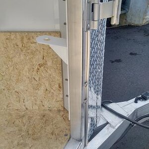 Custom bracket fabricated to hold 1 7/8 ball.