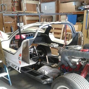 #7 Lifting the front half .... the orig exhaust pipes are now gone .... they prevented me from lowering the rear half down from 50 inches to 36 inches