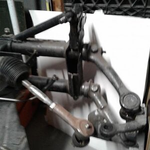 The right side front suspension with-out the coil-over