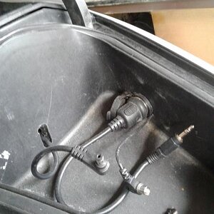 This is the MP-3 / Sirius XM plug that I removed from the rear trunk & some wires associated to the Sirius radio .....
