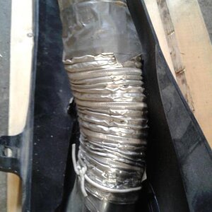 This is the other half of the Aluminum dryer tube connected to the inside of the oem panel