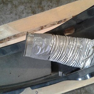 a different view of the alumin. tube connected to the oem right side panel ( inside )