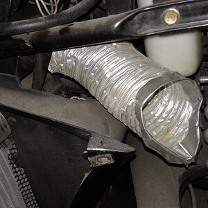 this is alum. dryer tube connected to the OEM air box snorkels