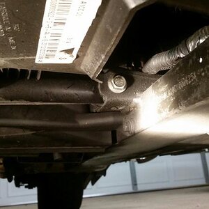 Looking under the vehicle from the front you will see the vin # on the center spar of the frame left side...