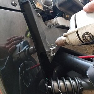 20180525 115023 2 #5
drill a hole in the back panel behind the oil access panel