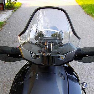 Stock shield but with SaengTa Edging for an extra couple inches of dead air behind the shield. Love the stuff. Also added a pair of cheapie universal 