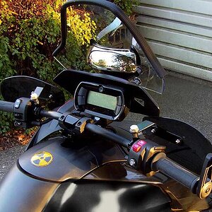 360 mirror mounted up, but maybe a waste of time and money. I'll leave it on only because I'd worry about damaging the windscreen ...