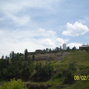 Stamp mill and mining stuff on the slope and hi