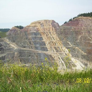 Pit, mineral intrusion there in the center.