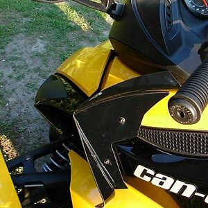 Wind deflectors...took these off because they readjusted the air flow around the bike and caused a horrible gas smell whether you were moving or not.